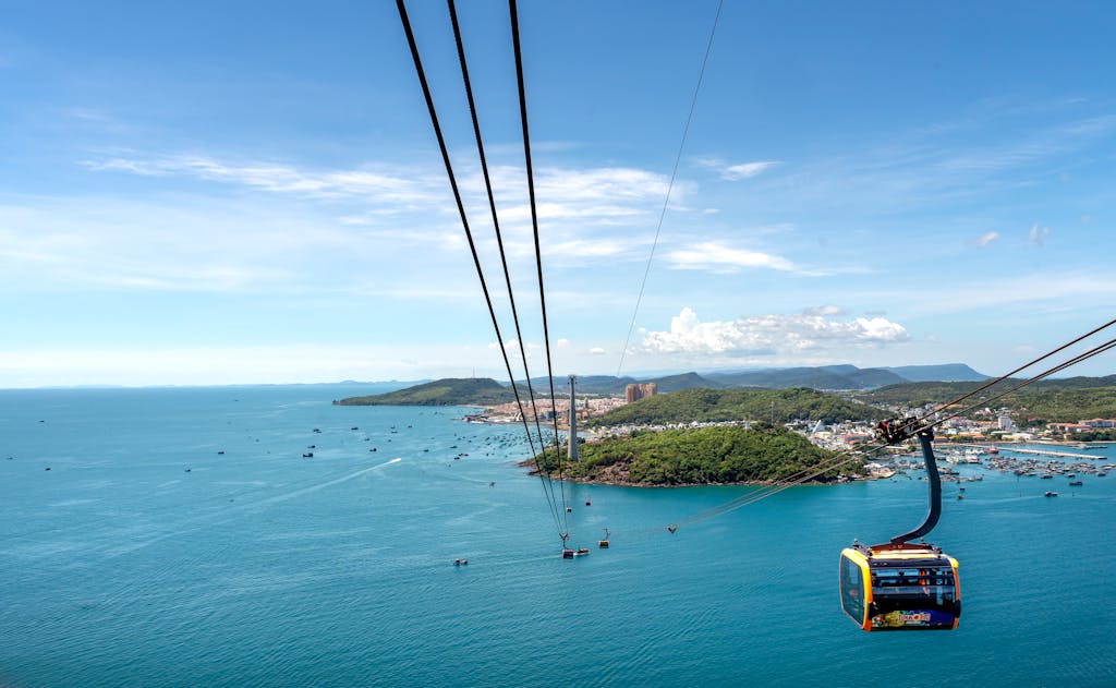 A breathtaking view of Hon Thom Cable Car over the turquoise sea and lush islands in Vietnam.