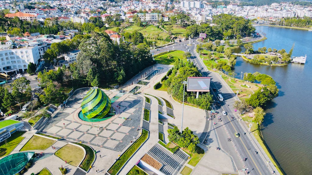 A stunning aerial shot of Lam Vien Square showcasing modern architecture and lush greenery in Đà Lạt, Vietnam.