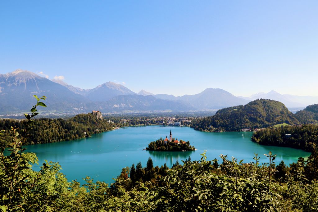 A breathtaking aerial view of Lake Bled and the Julian Alps in Slovenia, showcasing its natural beauty.